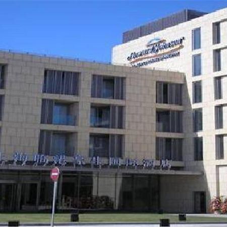 Howard Johnson Plaza Lingang Shanghai Nanhui Esterno foto