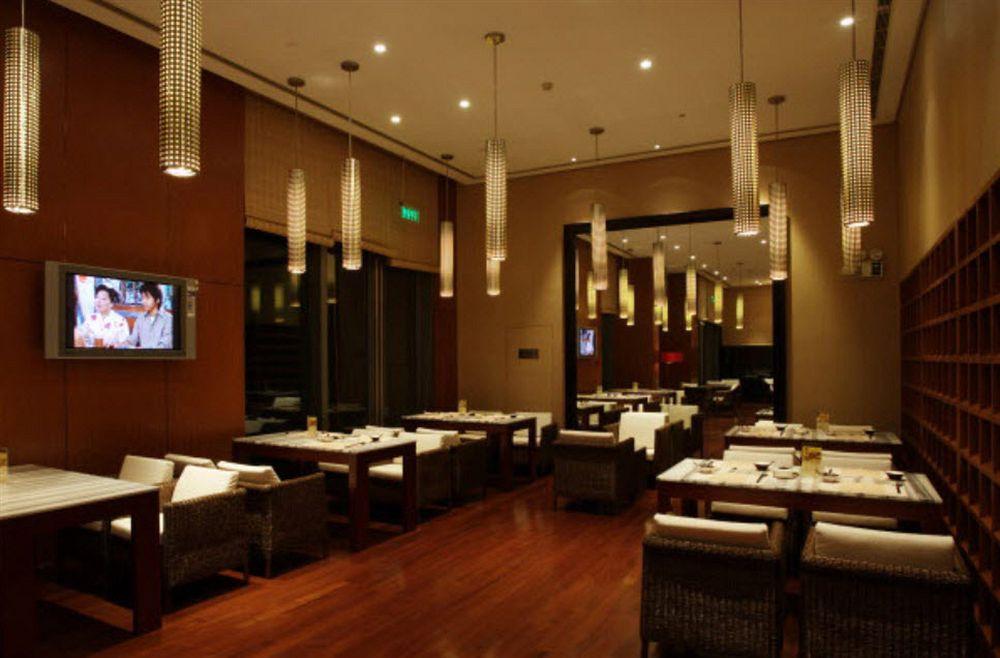 Howard Johnson Plaza Lingang Shanghai Nanhui Esterno foto