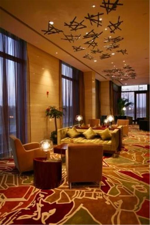 Howard Johnson Plaza Lingang Shanghai Nanhui Esterno foto