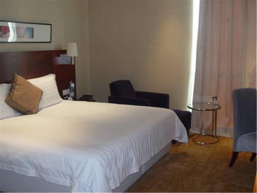 Howard Johnson Plaza Lingang Shanghai Nanhui Esterno foto
