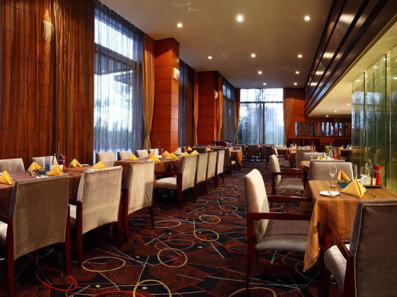 Howard Johnson Plaza Lingang Shanghai Nanhui Esterno foto